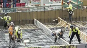  ??  ?? RIGHT, ABOVE AND BELOW: Constructi­on crews continue their work on Ice District.