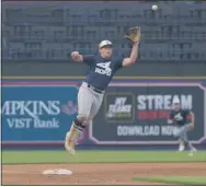  ?? OWEN MCCUE - MEDIANEWS GROUP ?? Royersford’s Matt Walbridge jumps for a throw in Thursday’s Baseballto­wn Charities Showcase at Reading FirstEnerg­y Stadium.