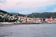  ?? KATHERINE RODEGHIER / TNS ?? BECKONING: Americans are becoming more familiar with the island of Grenada, and the capital of St. George’s is a popular port of call for cruise ships.