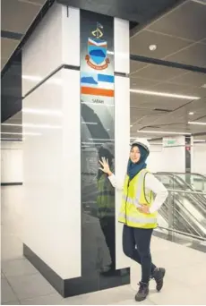  ??  ?? Arziah’s job as fire specialist instructor involves conducting training for all site employees working undergroun­d on the MRT Line 1.