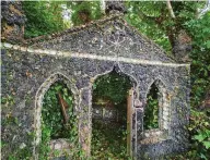  ?? ?? Look what a bit of weeding can reveal – a stunning gothic folly, lost for centuries