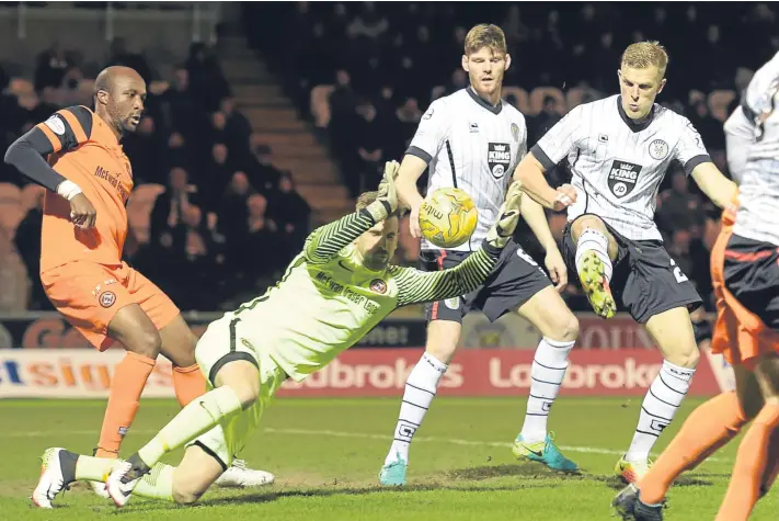  ?? Pictures: SNS Group. ?? Harry Davis manages to prod the ball past United keeper Cammy Bell to open the scoring for St Mirren.