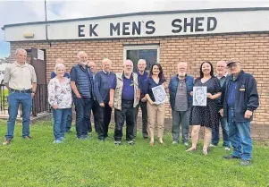  ?? ?? Warm welcome EK Men’s Shed, who were recently paid a visit by Monica Lennon MSP, third from right