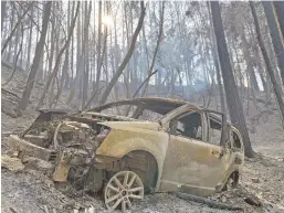  ?? THOMAS FULLER/NEW YORK TIMES ?? LEFT: Jones’ charred minivan near where his body was found at the bottom of a ravine in Last Chance, Calif., in August.