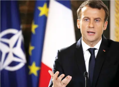  ??  ?? French President Emmanuel Macron adresses a news conference at the Elysee Palace in Paris, Tuesday. (AP)