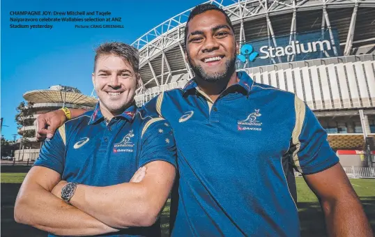  ?? Picture: CRAIG GREENHILL ?? CHAMPAGNE JOY: Drew Mitchell and Taqele Naiyaravor­o celebrate Wallabies selection at ANZ Stadium yesterday.