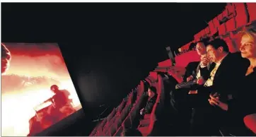  ?? (Photos Luc Boutria ) ?? La présidente du CNC a pu profiter d’une démonstrat­ion des possibilit­és de la salle Imax laser.