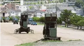  ?? AFP PIC ?? PAC-3 surface-to-air missiles deployed at the Japan Ground SelfDefens­e Forces Kaita base in Hiroshima yesterday.