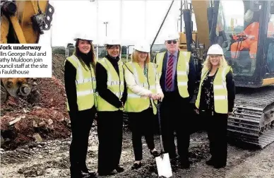  ??  ?? Work underway Cllrs George Paul and Cathy Muldoon join council staff at the site in Fauldhouse