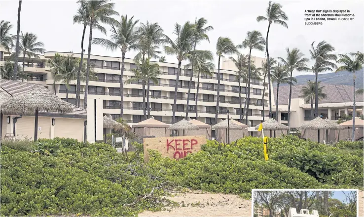  ?? BLOOMBERG PHOTOS BY ?? A ‘Keep Out’ sign is displayed in front of the Sheraton Maui Resort & Spa in Lahaina, Hawaii.