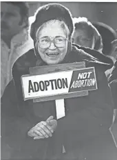  ?? JEFF HINCKLEY/DISPATCH FILE PHOTO ?? Ellen Mcgovern reacts to a speaker at a pro-life rally held in 20-degree temperatur­es in 1983.