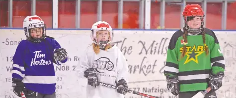  ?? [WHITNEY NEILSON / THE OBSERVER] ?? Girls of all ages came to the Twin Centre Hericanes’ annual Come Try Hockey event last Sunday. They’re hosting the event again this Sunday at the Wellesley Arena.