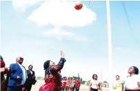  ?? - Pictures: John Manzongo ?? First Lady Dr Auxillia Mnangagwa shoots the ball during a netball match she organised at the skills developmen­t training centre in Mbare yesterday.