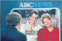  ?? THE ASSOCIATED PRESS ?? Andrew Garfield as Jim Bakker, centre, and Jessica Chastain as Tammy Faye Bakker in “The Eyes of Tammy Faye.”