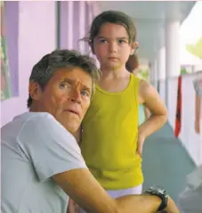  ?? A24 ?? Willem Dafoe (left) and Brooklynn Prince in a scene from “The Florida Project.”