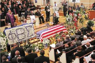  ?? —AP ?? COLUMBIA: People attend a funeral service for Rev Daniel Simmons Sr at Bethel AME church in Columbia, SC, on Thursday. Simmons was the last of the nine victims of the June 17 shootings at the predominan­tly black Charleston’s Emanuel AME to be buried.