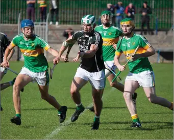  ??  ?? Avondale’s Eoin Baker wins possession during the IHC clash against Kilcoole in Pearse’s Park.