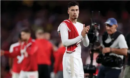  ?? Photograph: Ryan Pierse/Getty Images ?? Gabriel Martinelli applauds the home fans after Arsenal’s 1-0 win.