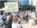  ?? RICHARD LAUTENS TORONTO STAR ?? Anti-vaccinatio­n protests were held Monday outside of hospitals across the country, including Toronto General.