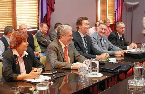  ?? Photos: Bev Lacey/Tom Gillespie ?? DECADE AGO: Regional shire mayors and councillor­s (from left) Anne Glasheen, the late Ian Orford, Peter Taylor, Geoff Patch and Craig Stibbard meet in Toowoomba City Council chambers over amalgamati­on in 2007.
