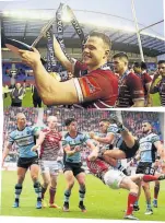  ??  ?? CHAMPIONS Burgess holds aloft the trophy after a superb Wigan victory