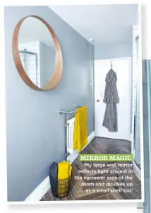  ??  ?? Mirror Magic ‘My large wall mirror reflects light around in the narrower area of the room and doubles up as a small shelf too’