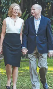  ??  ?? Dr Jeannette Young and her husband Professor Graeme Nimmo, a ‘great team’. Picture: Mark Cranitch