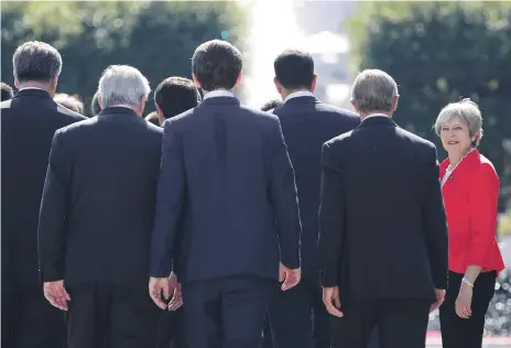  ?? Reuters ?? British Prime Minister Theresa May with European Union leaders at the summit in Salzburg, Austria