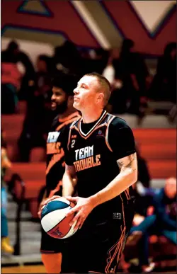  ?? COURTESY PHOTOGRAPH ?? Ezra Kiedrowski, a 2002 Lodi High graduate, gets ready to take a shot for Team Trouble, a semi-pro team in Stockton. Kiedrowski is enjoying a second chance to continue a basketball career that was derailed by addiction and prison time.