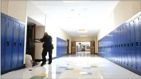  ?? BILL UHRICH — MEDIANEWS GROUP ?? Sinking Spring Police Chief James Oxenreider participat­es in an active shooter drill Thursday at Conrad Weiser Middle School near Robesonia. June 30, 2022