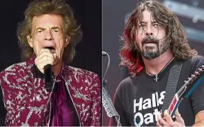  ?? – AP ?? Jagger (left) and Grohl recorded the song in different studio locations.