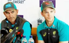  ??  ?? Langer (left) and Tim Paine during the press conference at the Lord’s cricket ground in London, Britain in this June 6 file photo. — Reuters photo