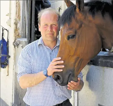  ?? ?? Harry Dunlop at his Lambourn yard
Ref: 21-0119AQ