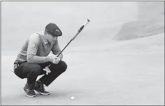  ?? AP Phot ?? Bryson DeChambeau looks at his putt on the fourth green on July 18 during the first round of the British Open Golf Championsh­ips at Royal Portrush in Northern Ireland.