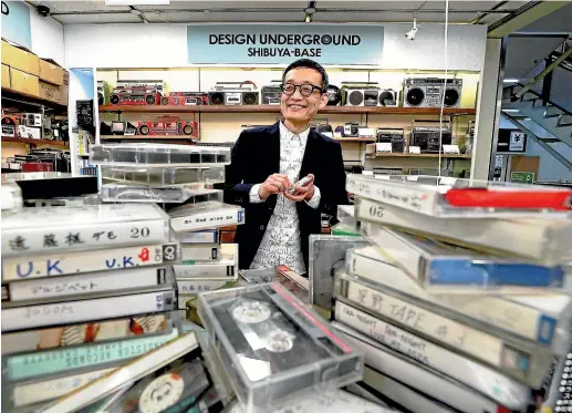  ?? JAPAN NEWS-YOMIMURI ?? Junichi Matsuzaki is an electronic­s collector who sells cassette tapes in Shibuya Ward, Tokyo. He has more than 600 used cassette tapes on display in his store.
