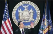  ?? HANS PENNINK — THE ASSOCIATED PRESS ?? In this Wednesday file photo, New York Gov. Andrew Cuomo makes reference to his father Mario Cuomo as he delivers his state of the state address at the Empire State Plaza Convention Center in Albany, N.Y. During the speech, Cuomo pledged to sue over...