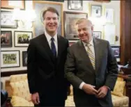  ?? MANUEL BALCE CENETA—THE ASSOCIATED PRESS ?? Supreme Court nominee Brett Kavanaugh, left, stands with Sen. Lindsey Graham, R-S.C. before the start of their meeting on Capitol Hill in Washington, Wednesday.