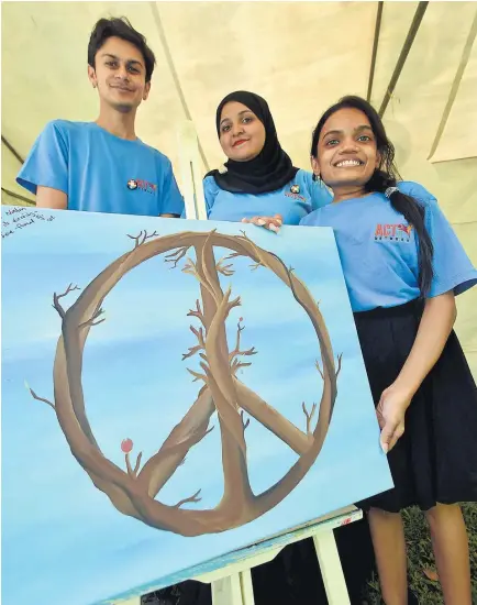  ?? Picture: ELIKI NUKUTABU ?? Avinen Singh, left, Najeeba Rahim and Neha Chand at the Internatio­nal Volunteers Day program in Suva.