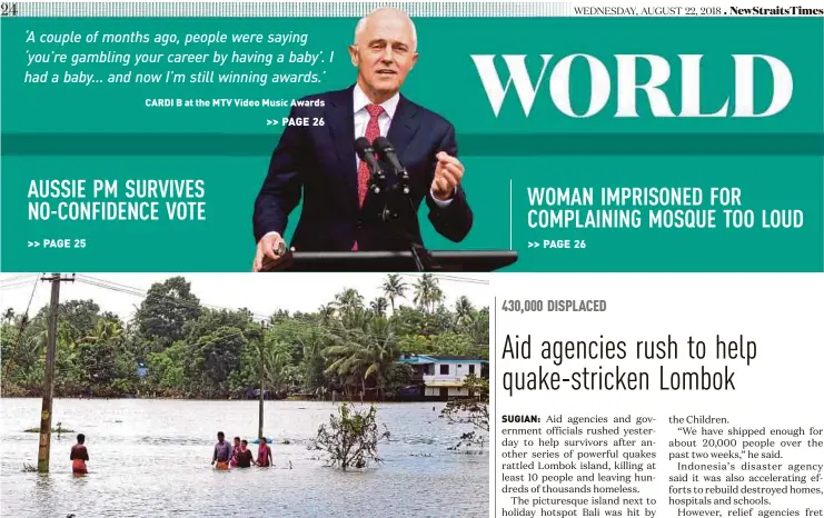  ?? EPA PIC ?? People wading through floodwater in Kerala on Monday.