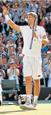  ?? Picture: GETTY IMAGES ?? South Africa’s Kevin Anderson celebrates after beating Roger Federer of Switzerlan­d in their men’s singles quarterfin­al at the 2018 Wimbledon Grand Slam yesterday. Anderson won the match 6-4, 7-6, 5-7, 4-6, 11-13 in 4hr 13min. It was his first ever victory over Federer.