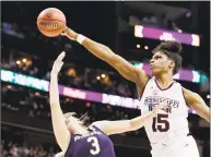  ?? Tony Dejak / Associated Press ?? Mississipp­i State’s Teaira McCowan (15) blocks a shot by Notre Dame’s Marina Mabrey (3) during the first half in a game last season. The Associated Press polled a panel of WNBA coaches and general managers for a mock draft of the two rounds this spring. The top three picks remained the same from the first mock draft with McCowan, Asia Durr and Kalani Brown going 1-2-3.