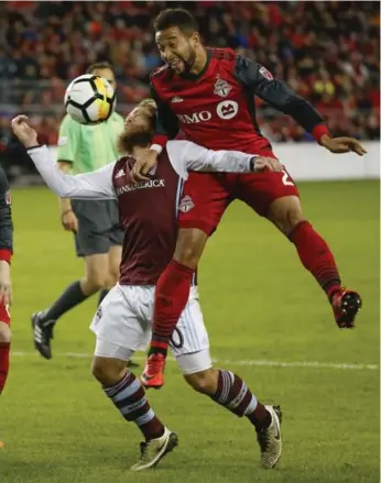  ?? RICK MADONIK/TORONTO STAR ?? TFC defender Justin Morrow gets the jump on Colorado midfielder Enzo Martinez in Tuesday’s deciding match in CONCACAF Champions League play. TFC’s early success there could jump-start their quest for an MLS repeat.