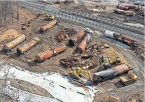  ?? MATT FREED/AP FILE ?? The National Transporta­tion Safety Board said investigat­ors determined the aluminum covers over the pressure relief valves on three of the five tank cars carrying vinyl chloride that derailed Feb. 3 in East Palestine, Ohio, melted and that some of the metal was found around the valves.