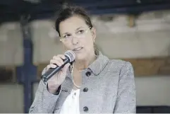  ??  ?? Top: Supporters of the right-wing group Pegida protest in Munich, Germany. Above: Politician Tatjana Festerling.