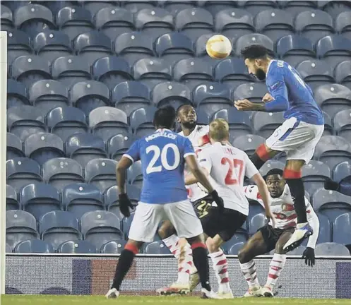  ??  ?? 0 Connor Goldson powers home a header for Rangers to make it 1-1 as Steven Gerrard’s men were forced to dig deep for victory.