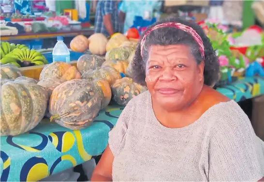  ?? Picture: SALASEINI GONELEVU ?? Karalaini Mainewa tends to her stall at the Sigatoka Municipal Market.