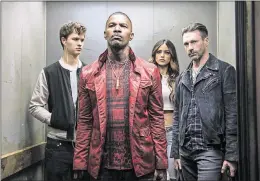  ?? CONTRIBUTE­D PHOTOS BY WILSON WEBB / SONY / TRISTAR ?? Ansel Elgort, Jamie Foxx, Eiza Gonzalez and Jon Hamm star in the new film “Baby Driver,” which filmed in Atlanta. Elgort plays a young getaway driver.