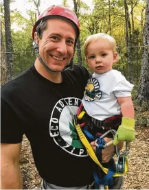  ?? Shannon Seper via Associated Press ?? Mike Seper, shown with his son, Connor, is owner of Eco Adventure Ziplines of New Florence, Mo. He debated deleting Facebook but wants to keep a connection to his customers.