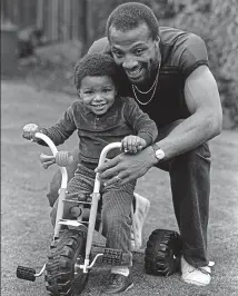 ?? GETTY IMAGES ?? Two up: Regis with his son Robert, 1982