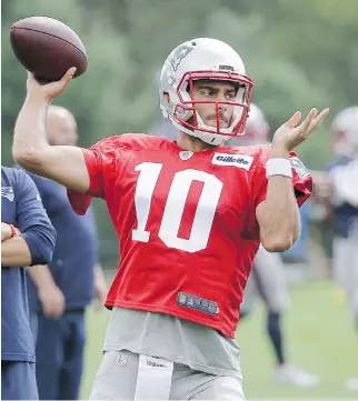  ?? THE ASSOCIATED PRESS/FILES ?? The New England Patriots either have no interest in trading Jimmy Garoppolo, or they’re listening to offers daily for the backup quarterbac­k.